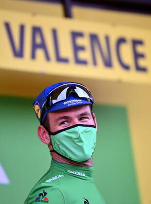 British Mark Cavendish of Deceuninck - Quick-Step celebrates on the podium in the green jersey of leader in the sprint ranking after stage 10 of the 108th edition of the Tour de France cycling race, 190,7 km from Albertville to Valence, France, Tuesday 06 July 2021. This year s Tour de France takes place from 26 June to 18 July 2021. DAVIDxSTOCKMAN x3028130x