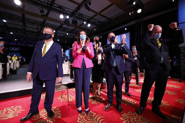 (210721) -- TOKYO, July 21, 2021 -- Members of the Brisbane 2032 delegation celebrate after Brisbane was announced as the 2032 Summer Olympics host city during the 138th International Olympic Committee (IOC) Session in Tokyo, Japan, on July 21, 2021. ( Pool via Xinhua) (SP)TOKYO-JAPAN-IOC-138TH SESSION ToruxHanai 