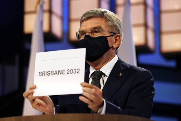 (210721) -- TOKYO, July 21, 2021 -- President of the International Olympic Committee Thomas Bach announces Brisbane as the 2032 Summer Olympics host city during the 138th International Olympic Committee (IOC) Session in Tokyo, Japan, on July 21, 2021. ( Pool via Xinhua) (SP)TOKYO-JAPAN-IOC-138TH SESSION ToruxHanai 