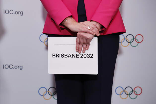 (210721) -- TOKYO, July 21, 2021 -- The Honourable Annastacia Palaszczuk MP, Premier of Queensland and Minister for Trade, holds the queue card after Brisbane was announced as the 2032 Summer Olympics host city during the 138th International Olympic Committee (IOC) Session in Tokyo, Japan, on July 21, 2021. ( Pool via Xinhua) (SP)TOKYO-JAPAN-IOC-138TH SESSION ToruxHanai 