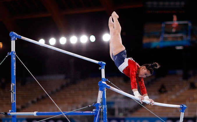 (210727) -- TOKYO, July 27, 2021 -- Sunisa Lee of the United States competes in the uneven bars of the artistic gymnastics women s team final at the Tokyo 2020 Olympic Games, Olympische Spiele, Olympia, OS in Tokyo, Japan, July 27, 2021. ) (TOKYO2020)JAPAN-TOKYO-OLY-ARTISTIC GYMNASTICS-WOMEN S TEAM-FINAL WangxLili