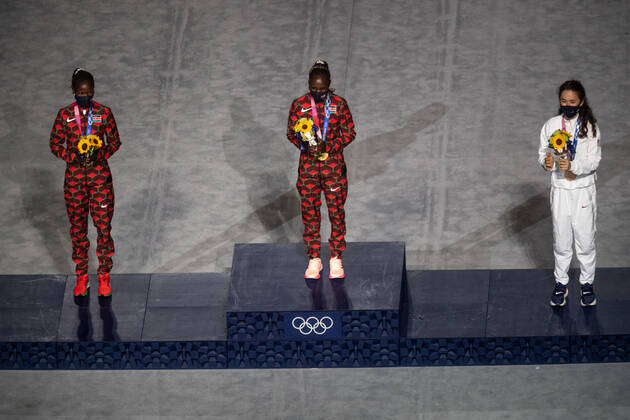 OLYMPICS - Summer Olympic Games, Olympische Spiele, Olympia, OS 2020 TOKYO,JAPAN,08.AUG.21 - OLYMPICS - Summer Olympic Games 2020, closing ceremony. Image shows the podium of the womens marathon with Brigid Kosgei (KEN), Peres Jepchirchir (KEN) and Molly Seidel (USA).  GEPAxpictures xMichaelxMeindl