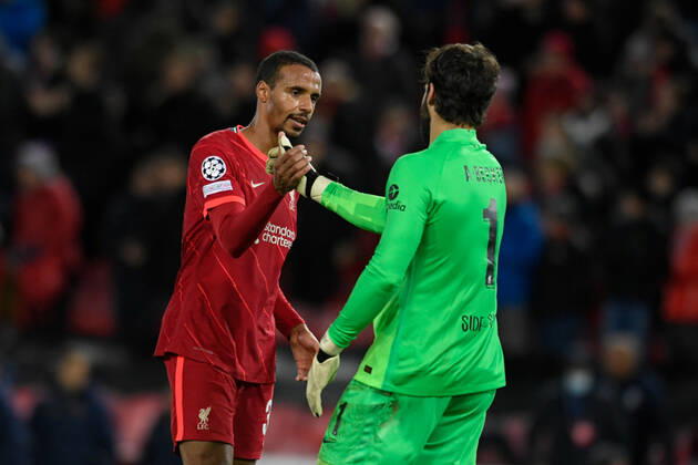 UEFA Champions League Liverpool v FC Porto Joel Matip 32 of Liverpool celebrates beating FC Porto 2-0 with Alisson Becker 1 of Liverpool Liverpool Anfield Merseyside United Kingdom Copyright: xSimonxWhitehead NewsxImagesx