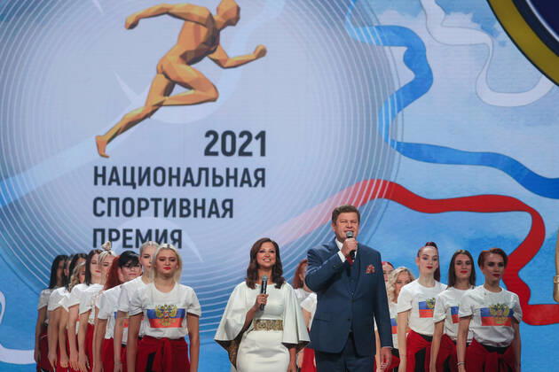MOSCOW, RUSSIA - DECEMBER 8, 2021: Rhythmic gymnast Yana Batyrshina and TV presenter Dmitry Guberniev (L-R centre) host a ceremony for the 2021 Russian National Sports Awards takes place at Irina Viner-Usmanova Gymnastics Palace. Established in 2010 and coming with a million-rouble prize, the award is given to athletes, coaches, journalists and regional government officials who contributed to the promotion of Russian sports. Gavriil Grigorov TASS  0144158526st