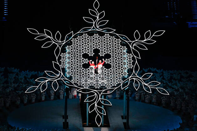 BEIJING, CHINA - FEBRUARY 04: Torch bearers Dinigeer Yilamujiang and Jiawen Zhao of Team China light the Olympic Cauldron during the Opening Ceremony of the Beijing 2022 Winter Olympics at the Beijing National Stadium on February 4, 2022 in Beijing, China.  Copyright: xVCGx CFP111367788730 