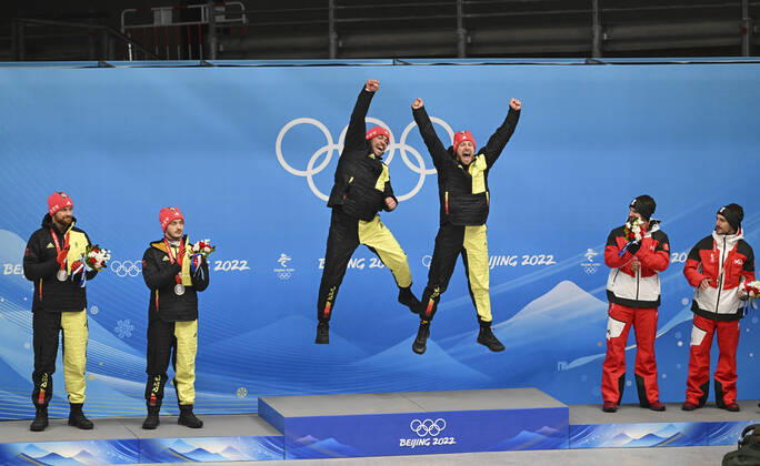 BEIJING, CHINA - FEBRUARY 09: Gold medalists Tobias Wendl and Tobias Arlt of Team Germany, silver medalists Toni Eggert and Sascha Benecken of Team Germany, bronze medalists Thomas Steu and Lorenz Koller of Austria celebrate at a flower ceremony for the Luge Doubles Run 2 on day five of the Beijing 2022 Winter Olympic Games, Olympische Spiele, Olympia, OS at Yanqing National Sliding Centre on February 9, 2022 in Beijing, China.  Copyright: xVCGx CFP111368571398 