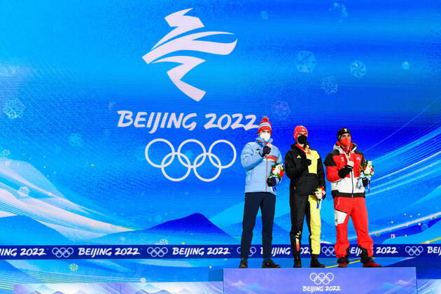 220210 Jorgen Graabak of Norway, Vinzenz Geiger of Germany and Lukas Greiderer of Austria celebrates with medals at the medal ceremony for men?s nordic combined individual during day 6 of the 2022 Winter Olympics on February 10, 2022 in Zhangjiakou. Photo: Vegard Grott BILDBYRAN kod VG VG0235 skidor nordic combined nordisk komination Olympic Games, Olympische Spiele, Olympia, OS olympics winter olympics os ol olympiska spel vinter-os olympiske leker peking peking 2022 beijing 2022 beijing 2022 olympic games beijing 2022 winter olympic games peking-os beijing-ol vinter-ol bbeng medaljeseremoni medaljceremoni medal ceremony norge norway celebration jubel silver Copyright: VEGARDxGRoTT BB220210VG064
