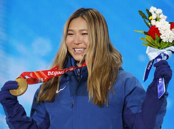 Beijing Olympics: Snowboard Gold medalist Chloe Kim of the United States poses during the medal ceremony for the women s snowboard halfpipe at the Beijing Winter Olympics on Feb. 10, 2022, in Zhangjiakou, China.  A14AA0001238197P