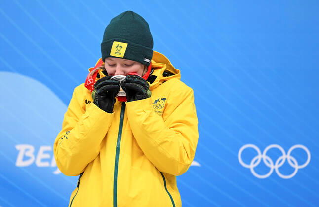 (220212) -- BEIJING, Feb. 12, 2022 -- Silver medalist Jaclyn Narracott (L) of Australia kisses her medal during the awarding ceremony of the skeleton women heat of Beijing 2022 Winter Olympics at National Sliding Centre in Yanqing District, Beijing, capital of China, Feb. 12, 2022. ) (BEIJING2022)CHINA-BEIJING-OLYMPIC Winter games, Winterspiele,Spiele, Summer games SKELETON-WOMEN HEAT (CN) HexChangshan 