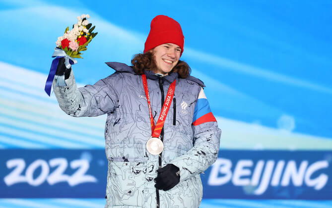 BEIJING, CHINA - FEBRUARY 14, 2022: Silver medalist, ROC athlete Konstantin Ivliyev attends an award ceremony for the men s 500m short track Speed skating, Eisschnelllauf event at the 2022 Winter Olympic Games, Olympische Spiele, Olympia, OS at the Medal Plaza. Anton Novoderezhkin TASS  TS12316A