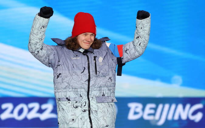 BEIJING, CHINA - FEBRUARY 14, 2022: Silver medalist, ROC athlete Konstantin Ivliyev attends an award ceremony for the men s 500m short track Speed skating, Eisschnelllauf event at the 2022 Winter Olympic Games, Olympische Spiele, Olympia, OS at the Medal Plaza. Anton Novoderezhkin TASS  TS12316D