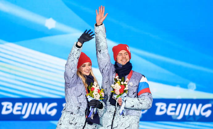 BEIJING, CHINA - FEBRUARY 14, 2022: Silver medalists, ROC athletes Victoria Sinitsina and Nikita Katsalapov attend an award ceremony for the ice dance event at the 2022 Winter Olympic Games, Olympische Spiele, Olympia, OS at the Medal Plaza. Anton Novoderezhkin TASS  TS123192