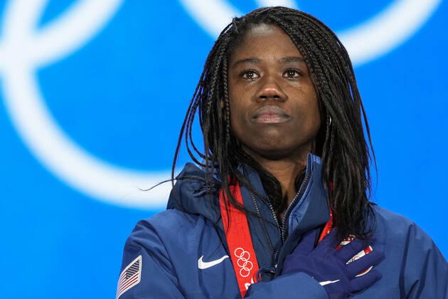 Erin Jackson of the U.S. cries as she listens to her national anthem during the medals ceremony for the Women s Speed skating, Eisschnelllauf 500 meter race at the Beijing 2022 Winter Olympics on Monday, February 14, 2022. Jackson won the gold medal.  OLY20220214301 PaulxHanna