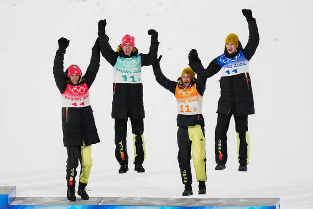 (220214) -- ZHANGJIAKOU, Feb. 14, 2022 -- Bronze medalists of Germany celebrate during the flower ceremony of Ski jumping, Skispringen, Ski, nordisch men s team at the National Ski Jumping Centre in Zhangjiakou, north China s Hebei Province, Feb. 14, 2022. ) (BEIJING2022) CHINA-ZHANGJIAKOU-OLYMPIC Winter games, Winterspiele,Spiele, Summer games SKI JUMPING-MEN S TEAM (CN) ZhuxZheng