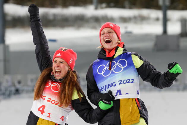 ZHANGJIAKOU, CHINA - FEBRUARY 16, 2022: Gold medalists Katharina Hennig (L) and Victoria Carl of Germany at a flower ceremony after the women s cross-country skiing team sprint classic final at the 2022 Winter Olympic Games, Olympische Spiele, Olympia, OS at the National Cross-Country Skiing Centre. Stanislav Krasilnikov TASS  TS12388A