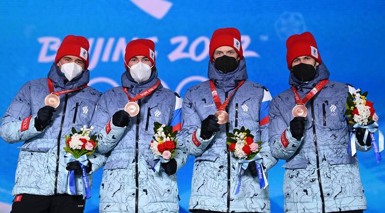 BEIJING 2022, Biathlon, 4x7,5km Staffel M?nner, Siegerehrung China Olympics 2022 Medal Ceremony 8117016 16.02.2022 Bronze medalists Russian Olympic Committee s Said Karimulla Khalili, Alexander Loginov, Maxim Tsvetkov and Eduard Latypov celebrate during an award ceremony for the biathlon men s 4x7.5 km relay event during the Beijing 2022 Winter Olympic Games, Olympische Spiele, Olympia, OS at the Medals Plaza in Zhangjiakou, China. Alexey Filippov Sputnik Beijing China Copyright: xAlexeyxFilippovx