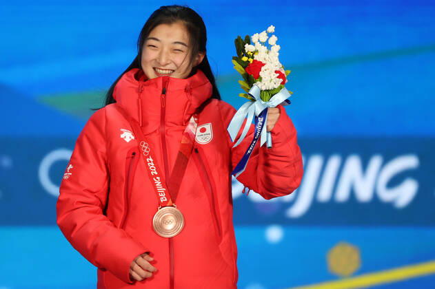 BEIJING, CHINA â€“ FEBRUARY 18, 2022: Figure skater Kaori Sakamoto of Japan poses with her bronze medal at a victory ceremony for the ladies Figure skating, Eiskunstlauf event at the Beijing 2022 Winter Olympic Games, Olympische Spiele, Olympia, OS at the Beijing Medals Plaza. Anton Novoderezhkin TASS  TS124156