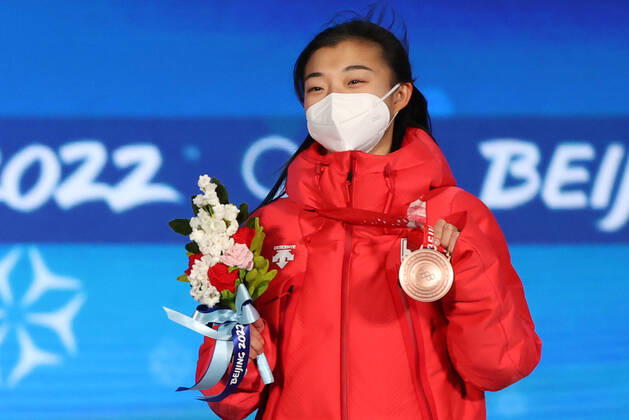 BEIJING, CHINA â€“ FEBRUARY 18, 2022: Figure skater Kaori Sakamoto of Japan poses with her bronze medal at a victory ceremony for the ladies Figure skating, Eiskunstlauf event at the Beijing 2022 Winter Olympic Games, Olympische Spiele, Olympia, OS at the Beijing Medals Plaza. Anton Novoderezhkin TASS  TS12417F