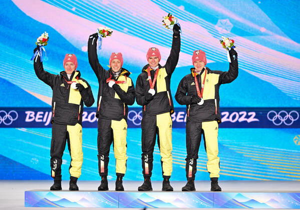 (220218) -- ZHANGJIAKOU, Feb. 18, 2022 -- Silver medalists of Germany pose during the awarding ceremony of nordic combined team gundersen large hill 4x5km at Zhangjiakou Medals Plaza of the Winter Olympics in Zhangjiakou, north China s Hebei Province, Feb. 18, 2022. ) (BEIJING2022)CHINA-ZHANGJIAKOU-OLYMPIC Winter games, Winterspiele,Spiele, Summer games AWARDING CEREMONY-NORDIC COMBINED (CN) ZhuxZheng 
