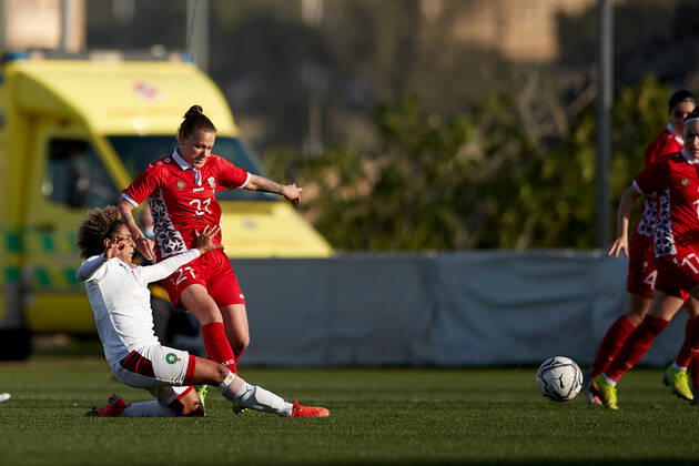 Morocco women™s national soccer team player Sanaa Mssoudy (L) goes in with her challenge on Irina Topal (R) of Moldova during the VisitMalta Women s International Trophy 2022 tournament soccer match between Morocco and Moldova at the Tony Bezzina Stadium, Paola, Malta on 22 February 2022. Morocco beat Moldova 4-0 to win the tournament. Morocco v Moldova Women™s VMW_22