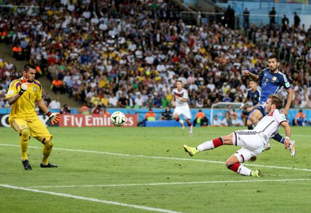 Football - 2014 FIFA World Cup, WM, Weltmeisterschaft, Fussball - Final - Germany v Argentina 13 July 2014 - FIFA World Cup - Final - Germany v Argentina - Mario Gotze of Germany scores the winning goal - Photo: Marc Atkins Offside. Rio de Janeiro Brazil Copyright: xMarcxAtkinsxOffside