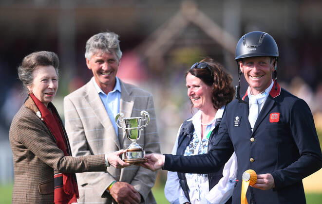 8th May 2022, Badminton Estate, Gloucestershire, England; Mars Equestrian Badminton Horse Trials, day 5; Oliver Townend receives the third place trophy from HRH Princess Anne  ActionPlus12388138 SimonxWest Content restricted for UK based newspaper