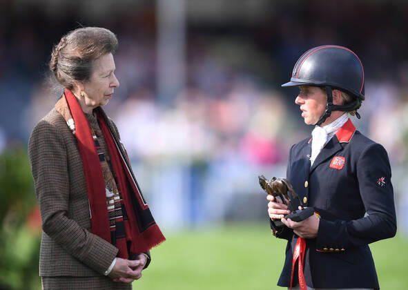 8th May 2022, Badminton Estate, Gloucestershire, England; Mars Equestrian Badminton Horse Trials, day 5; Rosalind Canter receives the runners up trophy from HRH Princess Anne after coming second on her horse Lordships Graffalo in Badminton Horse Trials 2022  ActionPlus12388140 SimonxWest Content restricted for UK based newspaper