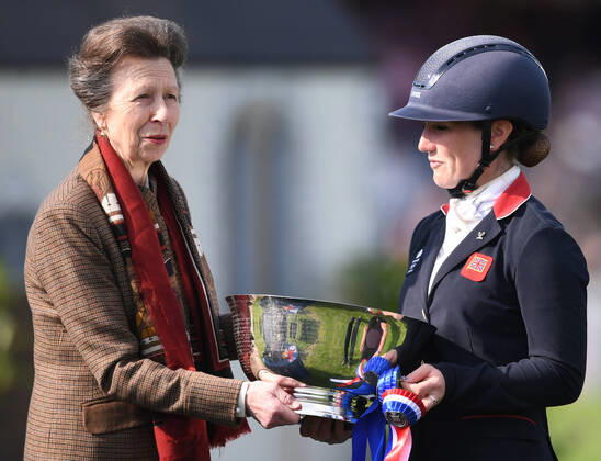 8th May 2022, Badminton Estate, Gloucestershire, England; Mars Equestrian Badminton Horse Trials, day 5; Laura Collett receives the Badminton Horse Trials 2022 winning trophy  ActionPlus12388142 SimonxWest Content restricted for UK based newspaper