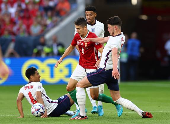 Budapest, Hungary, 4th June 2022. Declan Rice of England tackles Adam Nagy of Hungary during the UEFA Nations League match at Puskas Arena, Budapest. Picture credit should read: David Klein Sportimage EDITORIAL USE ONLY. No use with unauthorised audio, video, data, fixture lists, club league logos or live services. Online in-match use limited to 120 images, no video emulation. No use in betting, games or single club league player publications. SPI-1726-0059