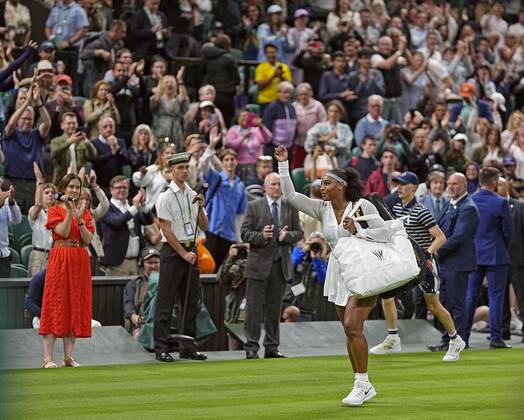 Tennis: Wimbledon championships Serena Williams of the United States acknowledges spectators as she leaves the court after being defeated by Harmony Tan of France in the first round of the Wimbledon tennis tournament in London on June 28, 2022. A14AA0001307378P