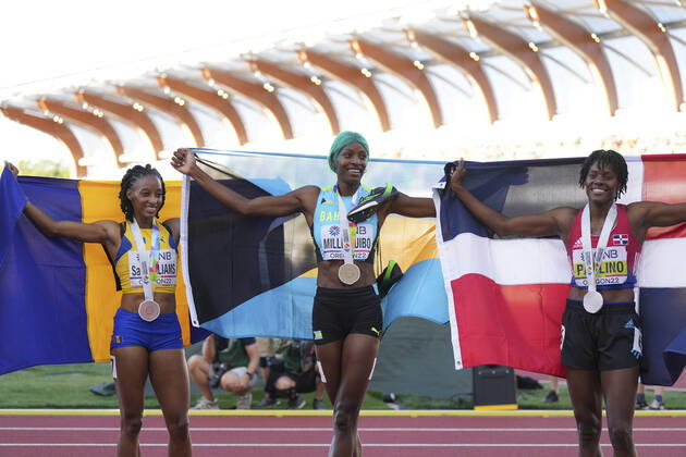 (220723) -- EUGENE, July 23, 2022 -- Shaunae Miller-Uibo (C) of Bahamas, Marileidy Paulino (R) of the Dominican Republic and Sada Williams of Barbados celebrate after the women s 400m final at the World Athletics Championships Oregon22 in Eugene, Oregon, the United States, July 22, 2022. ) (SP)U.S.-EUGENE-ATHLETICS-WORLD CHAMPIONSHIPS-WOMEN S 400M FINAL WangxYing 