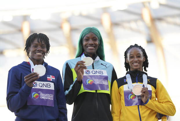 (220723) -- EUGENE, July 23, 2022 -- Gold medalist Shaunae Miller-Uibo (C) of Bahamas, silver medalist Marileidy Paulino (L) of the Dominican Republic and bronze medalist Sada Williams of Barbados pose for photos during the women s 400m awarding ceremony at the World Athletics Championships Oregon22 in Eugene, Oregon, the United States, July 22, 2022. ) (SP)U.S.-EUGENE-ATHLETICS-WORLD CHAMPIONSHIPS-WOMEN S 400M-AWARDING CEREMONY WangxYing 