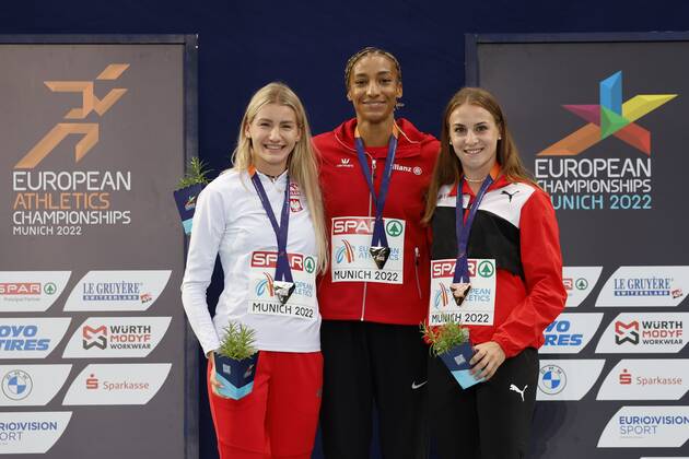 Munich, Germany - August 19 : Thiam Nafi Athletics Heptathlon (Female) of Belgium pictured during the podium ceremony with Kalin Annik of Switzerland second place and third place Adrianna SuBek of Polen during the 2022 European Championships Athletics as part of the European Championships Munich 2022 on August 19, 2022 in Munich, Germany, 19 08 2022 ( European Championship, EM, Europameisterschaft Athletics Munich 2022 PhotoNews Panoramic 