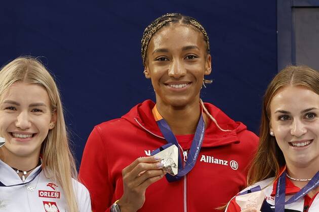 Munich, Germany - August 19 : Thiam Nafi Athletics Heptathlon (Female) of Belgium pictured during the podium ceremony with Kalin Annik of Switzerland second place and third place Adrianna SuBek of Polen during the 2022 European Championships Athletics as part of the European Championships Munich 2022 on August 19, 2022 in Munich, Germany, 19 08 2022 ( European Championship, EM, Europameisterschaft Athletics Munich 2022 PhotoNews Panoramic 
