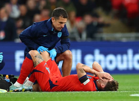 London, England, 26th September 2022. John Stones of England goes down with an injury during the UEFA Nations League match at Wembley Stadium, London. Picture credit should read: David Klein Sportimage EDITORIAL USE ONLY. No use with unauthorised audio, video, data, fixture lists, club league logos or live services. Online in-match use limited to 120 images, no video emulation. No use in betting, games or single club league player publications. SPI-1909-0050