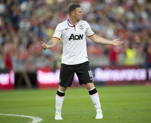 Wayne Rooney of Manchester United, ManU reacts after missing a penalty kick during the Barcelona FC vs. Manchester United friendly soccer match at Ullevi Arena in Goteborg, Sweden, Wednesday Aug. 8, 2012. Photo Bjorn Larsson Rosvall SCANPIX SWEDEN kod 9200 GOTEBORG SWEDEN Soccer x9200x