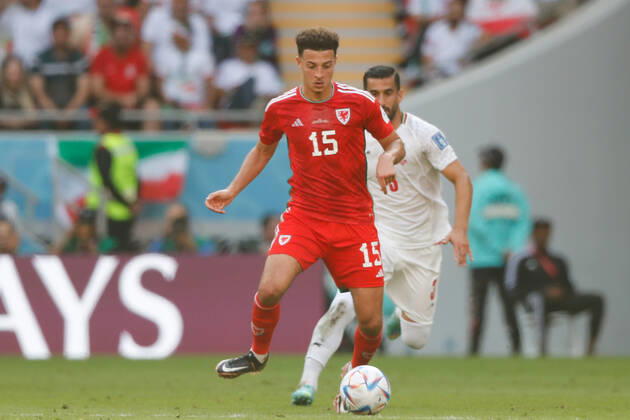 Wales v Iran 2022 FIFA World Cup, WM, Weltmeisterschaft, Fussball Ethan Ampadu of Wales holds the ball up from Ehsan Hajsafi of Iran during the 2022 FIFA World Cup Group B match at Ahmad Bin Ali Stadium, Al-Rayyan Content Not Available For UK Newspapers Copyright: xPaulxChestertonx FIL-17643-0066 UK Newspapers OUT