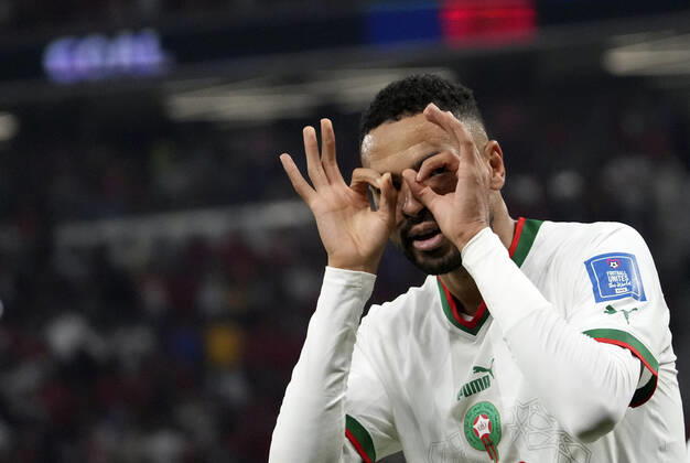 (221201) -- DOHA, Dec. 1, 2022 -- Youssef En-Nesyri of Morocco celebrates after scoring team s second goal during the Group F match between Canada and Morocco at the 2022 FIFA World Cup, WM, Weltmeisterschaft, Fussball at Al Thumama Stadium in Doha, Qatar, Dec. 1, 2022. ) (SP)QATAR-DOHA-2022 WORLD CUP-GROUP F-CAN VS MAR LixGang 