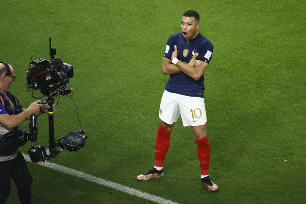 Kylian Mbappe of France celebrates a goal during the FIFA round 16 soccer match between France and Poland at Al Thumama a stadium in Doha, Qatar, 04 December 2022. World Cup 2022: France vs. Poland !ACHTUNG: NUR REDAKTIONELLE NUTZUNG! Copyright: xRodrigoxJiménezx GR7175 20221204-8207ec312743cd511136e640dfaa080cd2d87c03