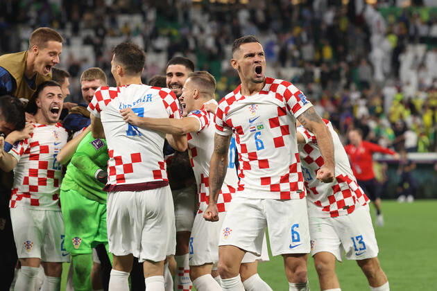 Croatia v Brazil : FIFA World Cup, WM, Weltmeisterschaft, Fussball 9 December 2022, Doha - FIFA World Cup Qatar 2022 - Quarter-Finals - Croatia v Brazil - Dejan Lovren of Croatia celebrates victory with his team mates - Photo: Charlotte Wilson Offside. Doha Qatar Copyright: xCharlottexWilsonx xOffsidexOffside