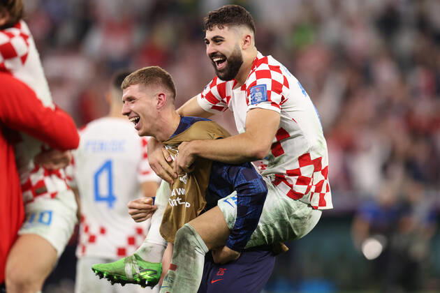 Croatia v Brazil : FIFA World Cup, WM, Weltmeisterschaft, Fussball 9 December 2022, Doha - FIFA World Cup Qatar 2022 - Quarter-Finals - Croatia v Brazil - Josko Gvardiol of Croatia and Kristijan Jakic of Croatia celebrate victory - Photo: Charlotte Wilson Offside. Doha Qatar Copyright: xCharlottexWilsonx xOffsidexOffside