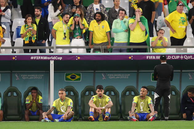 Croatia v Brazil : FIFA World Cup, WM, Weltmeisterschaft, Fussball 9 December 2022, Doha - FIFA World Cup Qatar 2022 - Quarter-Finals - Croatia v Brazil - Raphinha of Brazil, Lucas Paqueta of Brazil and Eder Militao of Brazil looks dejected after his team are knocked out of the World Cup - Photo: Charlotte Wilson Offside. Doha Qatar Copyright: xCharlottexWilsonx xOffsidexOffside