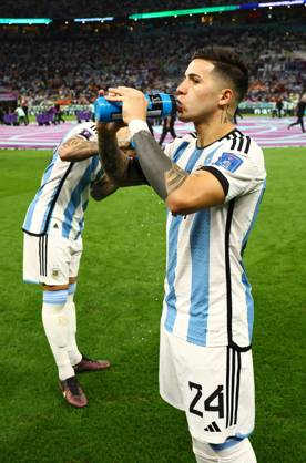 Doha, Qatar, 9th December 2022. Enzo Fernandez of Argentina takes on board fluids during the FIFA World Cup, WM, Weltmeisterschaft, Fussball 2022 match at Lusail Stadium, Doha. Picture credit should read: David Klein Sportimage EDITORIAL USE ONLY. No use with unauthorised audio, video, data, fixture lists, club league logos or live services. Online in-match use limited to 120 images, no video emulation. No use in betting, games or single club league player publications. SPI-2091-0039