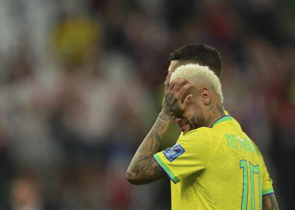 (221209) -- AL RAYYAN, Dec. 9, 2022 -- Neymar of Brazil cries after the Quarterfinal match between Croatia and Brazil of the 2022 FIFA World Cup, WM, Weltmeisterschaft, Fussball at Education City Stadium in Al Rayyan, Qatar, Dec. 9, 2022. ) (SP)QATAR-AL RAYYAN-2022 WORLD CUP-QUARTERFINAL-CRO VS BRA XiaoxYijiu