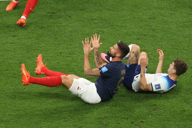 England v France : FIFA World Cup, WM, Weltmeisterschaft, Fussball 10 December 2022, Al Kohr - FIFA World Cup Qatar 2022 - Quarter-Finals - England v France - Olivier Giroud of France and John Stones of England - Photo: Charlotte Wilson Offside. Al Kohr Qatar Copyright: xCharlottexWilsonx xOffsidexOffside