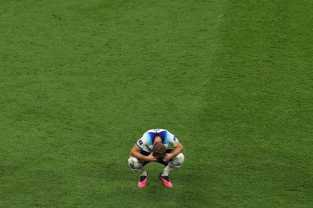 England v France : FIFA World Cup, WM, Weltmeisterschaft, Fussball 10 December 2022, Al Kohr - FIFA World Cup Qatar 2022 - Quarter-Finals - England v France - Harry Kane of England takes a moment to himself at the final whistle after a penalty missed means England couldn™t equalise - Photo: Charlotte Wilson Offside. Al Kohr Qatar Copyright: xCharlottexWilsonx xOffsidexOffside