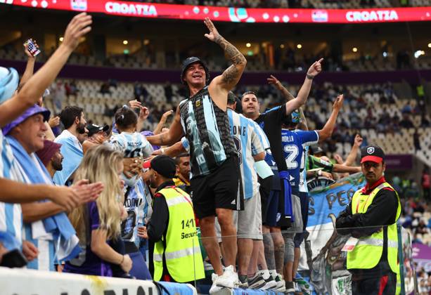 Doha, Qatar, 13th December 2022. Argentina fans during the FIFA World Cup, WM, Weltmeisterschaft, Fussball 2022 match at Lusail Stadium, Doha. Picture credit should read: David Klein Sportimage EDITORIAL USE ONLY. No use with unauthorised audio, video, data, fixture lists, club league logos or live services. Online in-match use limited to 120 images, no video emulation. No use in betting, games or single club league player publications. SPI-2097-0012