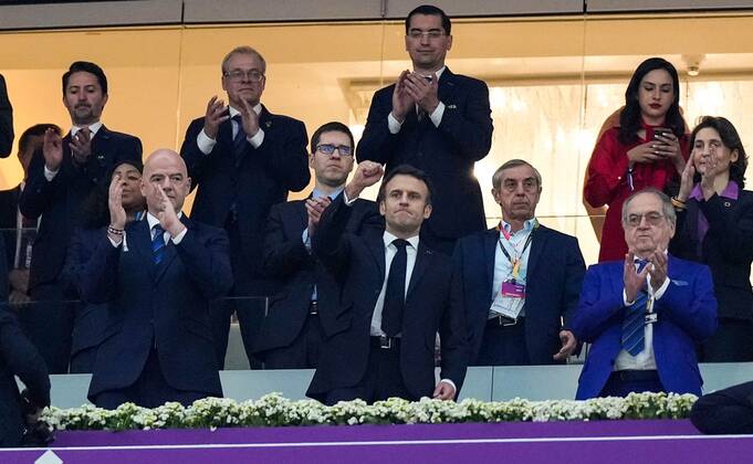 Mandatory Credit: Photo by Dave Shopland Shutterstock (13661844s) President of France Emmanuel Macron fist pumps during the national anthem alongside President of FIFA Gianni Infantino France v Morocco, FIFA World Cup, WM, Weltmeisterschaft, Fussball 2022, Semi Final, Football, Al Bayt Stadium, Al Khor, Qatar - 14 Dec 2022 Editorial Use Only France v Morocco, FIFA World Cup 2022, Semi Final, Football, Al Bayt Stadium, Al Khor, Qatar - 14 Dec 2022 Editorial Use Only Copyright: xDavexShopland Shutterstockx 13661844s