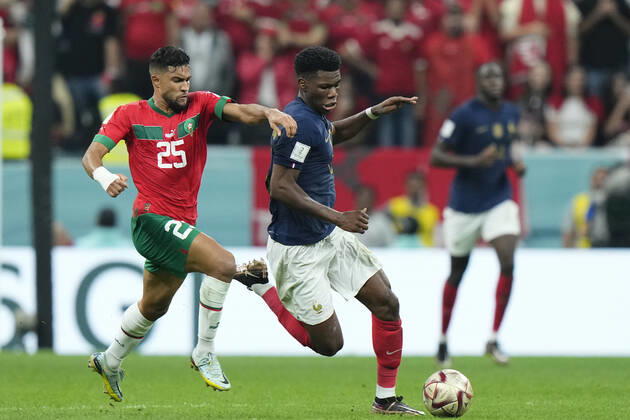 France v Morocco: Semi Final - FIFA World Cup, WM, Weltmeisterschaft, Fussball Qatar 2022 Aurelien Tchouameni defensive midfield of France and Real Madrid and Yahia Attiat-Allah left-back of Morocco and Wydad Casablanca compete for the ball during the FIFA World Cup Qatar 2022 semi final match between France and Morocco at Al Bayt Stadium on December 14, 2022 in Al Khor, Qatar. Al Khor Qatar Copyright: xJosexBretonx originalFilename:breton-francevm221214_npLy3
