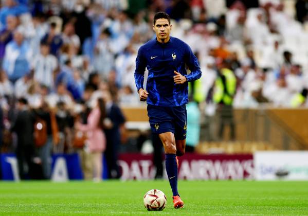 Doha, Qatar, 18th December 2022. Raphael Varane of France warms up beffore the FIFA World Cup, WM, Weltmeisterschaft, Fussball 2022 match at Lusail Stadium, Doha. Picture credit should read: David Klein Sportimage EDITORIAL USE ONLY. No use with unauthorised audio, video, data, fixture lists, club league logos or live services. Online in-match use limited to 120 images, no video emulation. No use in betting, games or single club league player publications. SPI-2101-0022